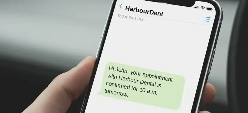 Phone showing an appointment confirmation SMS